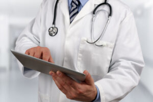 24930930 - doctor in hospital using a digital tablet
